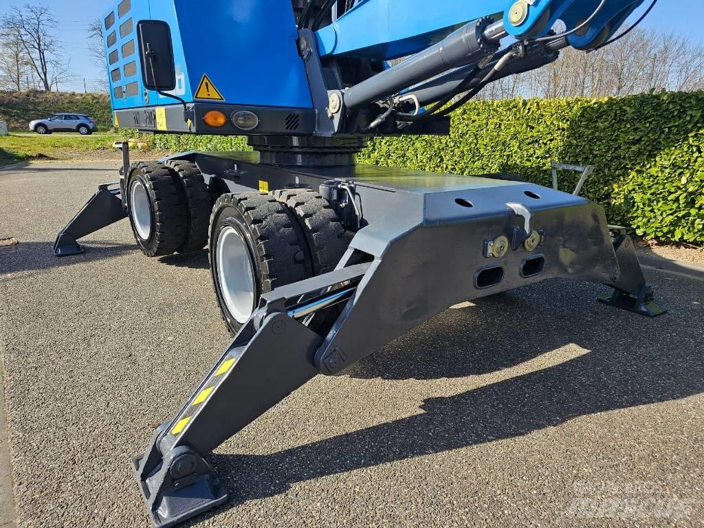 Fuchs MHL 320 Stroje pre manipuláciu s odpadom