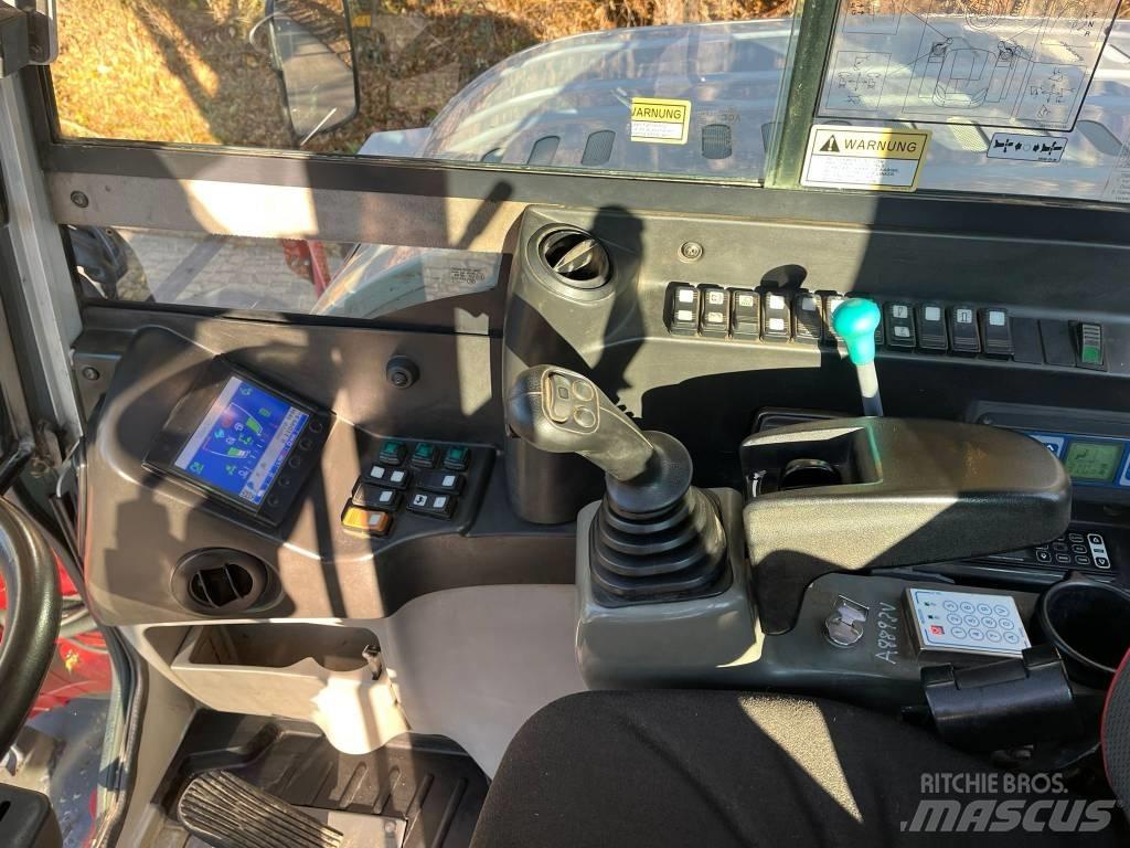 Takeuchi TB295W Kolesové rýpadlá