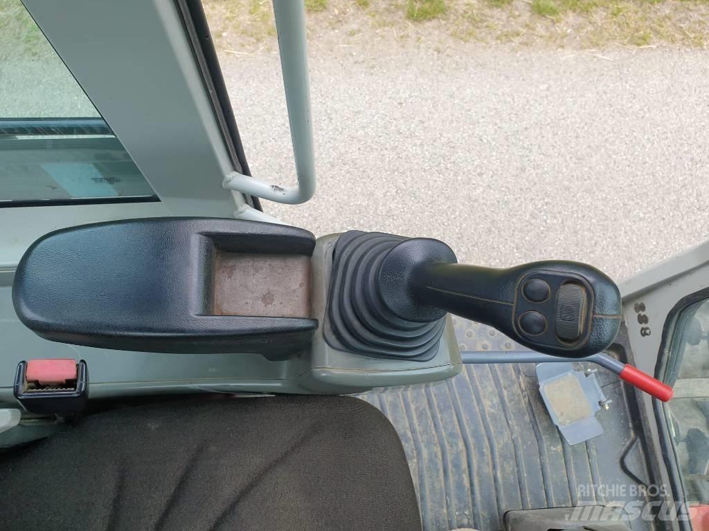 Takeuchi TB295W Kolesové rýpadlá