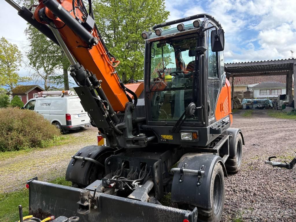Develon DX 100 W-7 Kolesové rýpadlá
