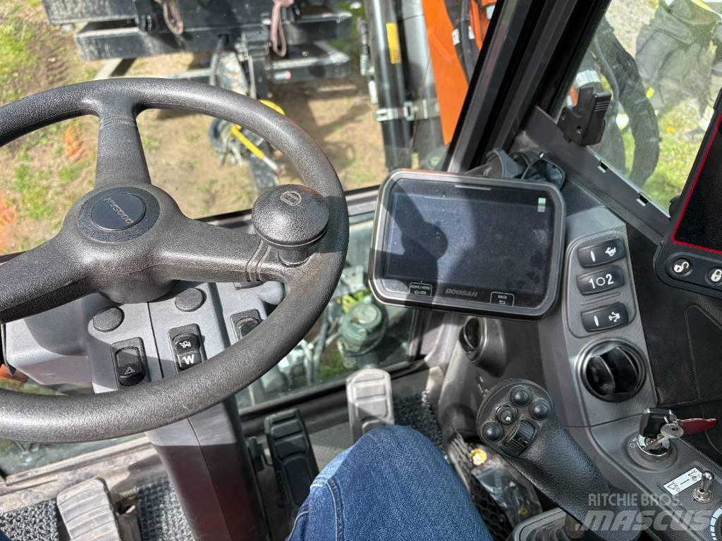 Develon DX 100 W-7 Kolesové rýpadlá