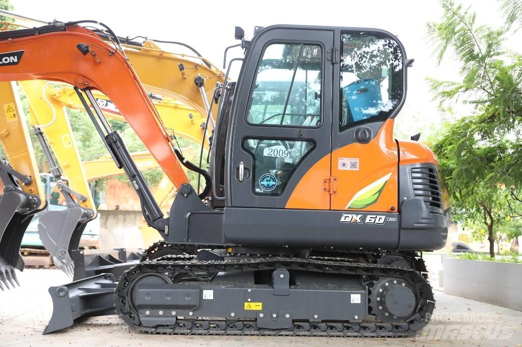 Develon DX 60 E-10 N Kolesové rýpadlá