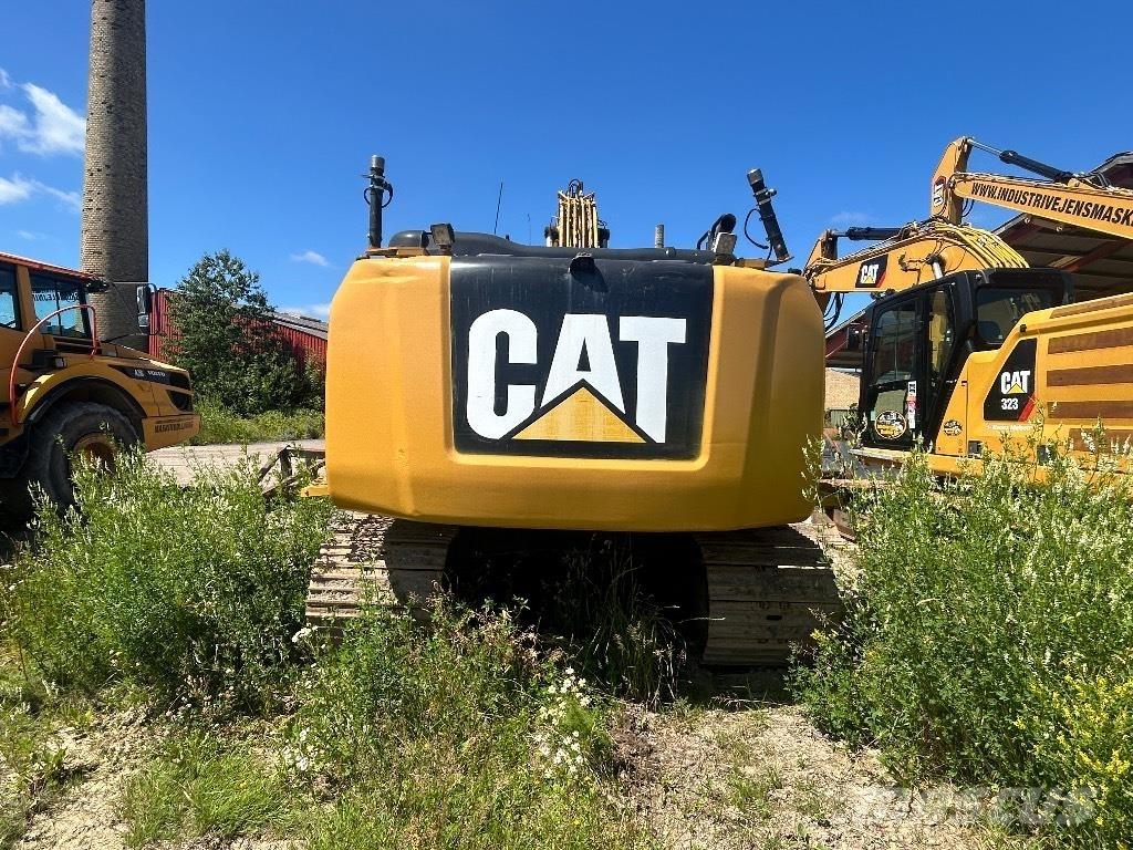 CAT 323 EL Pásové rýpadlá