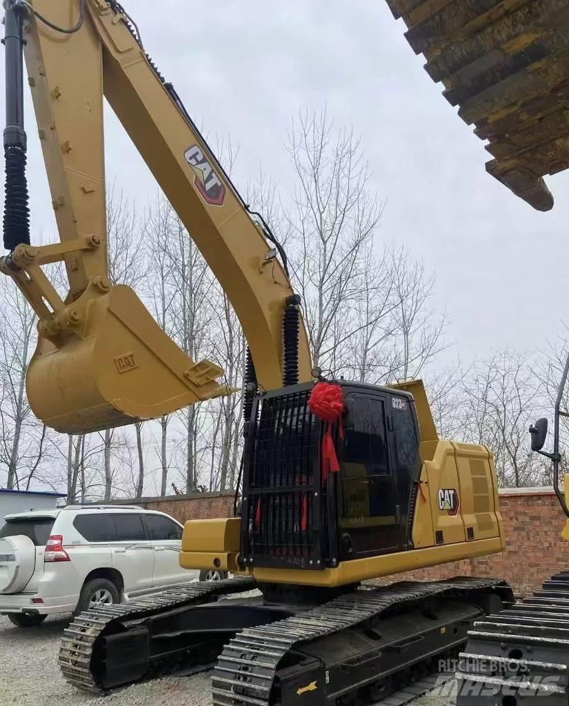 CAT 323 Pásové rýpadlá