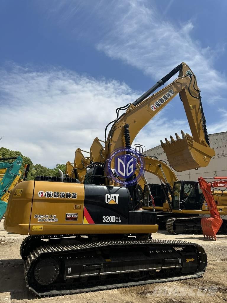 CAT CAT323 Pásové rýpadlá