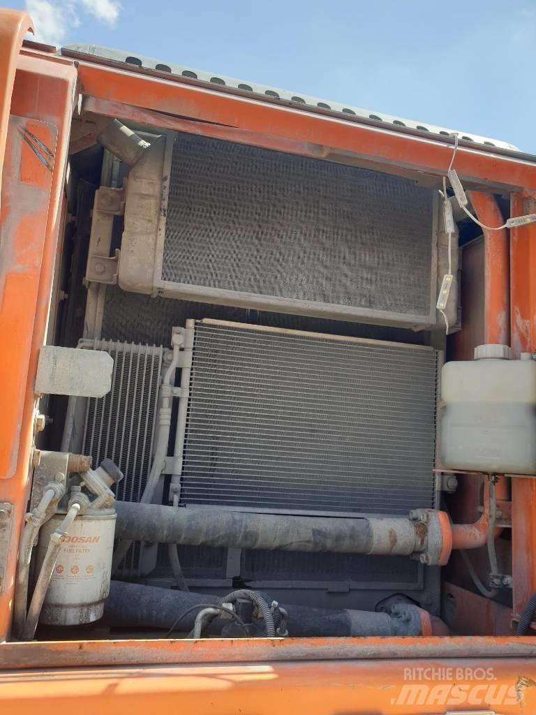 Doosan DX210WA Kolesové rýpadlá
