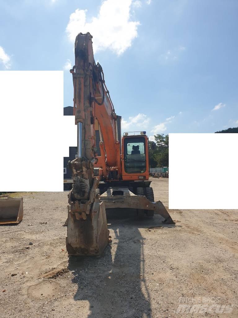 Doosan DX210WA Kolesové rýpadlá