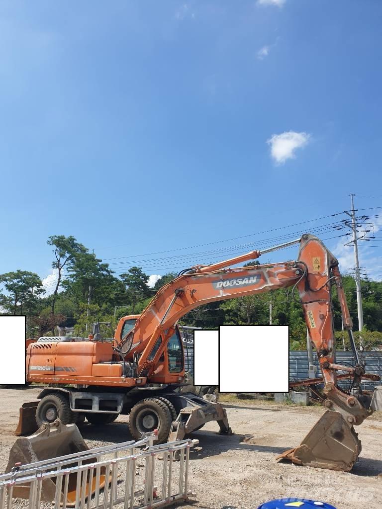 Doosan DX210WA Kolesové rýpadlá