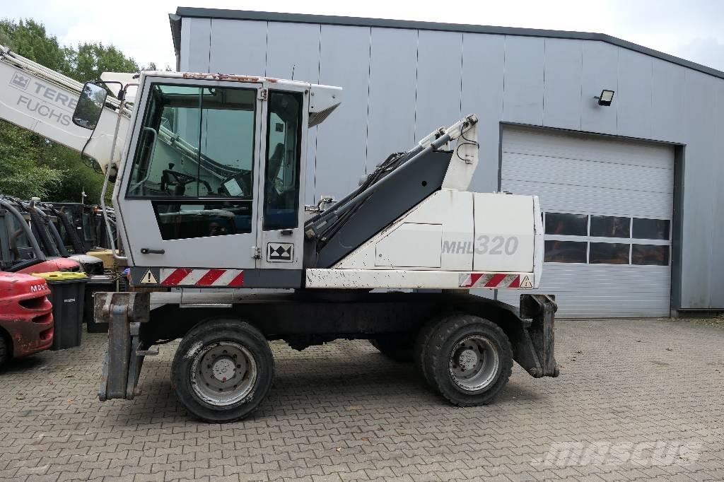 Fuchs MHL 320 Stroje pre manipuláciu s odpadom