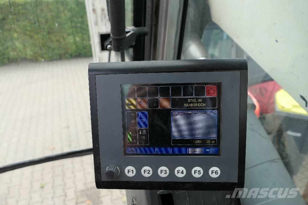 Fuchs MHL 320 Stroje pre manipuláciu s odpadom