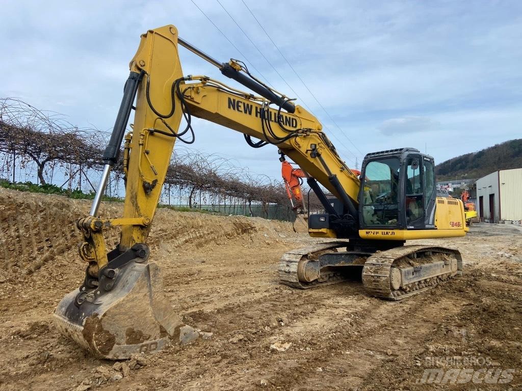 New Holland E245 Pásové rýpadlá