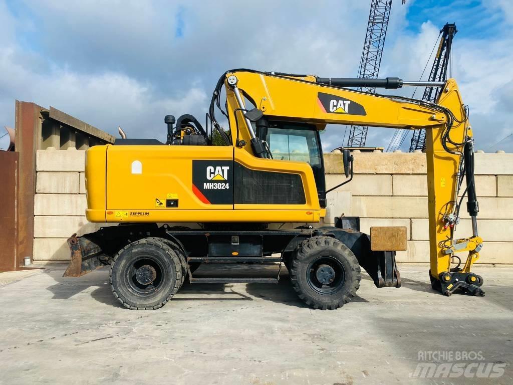CAT mh3024 Kolesové rýpadlá