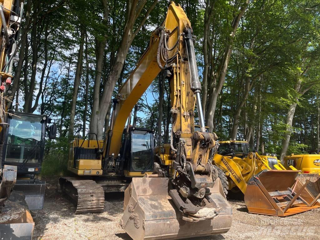 CAT 323 Pásové rýpadlá