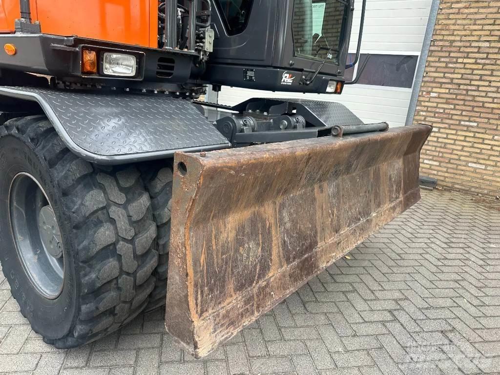 Doosan DX140W-5 Kolesové rýpadlá