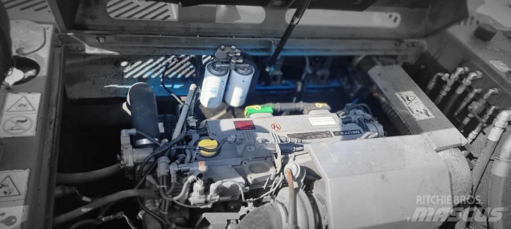 Fuchs MHL 355 Stroje pre manipuláciu s odpadom