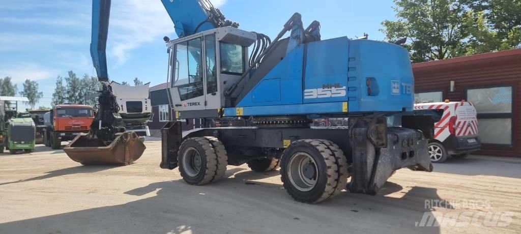Fuchs MHL 355 Stroje pre manipuláciu s odpadom