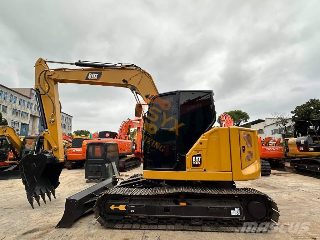 CAT 310 Pásové rýpadlá