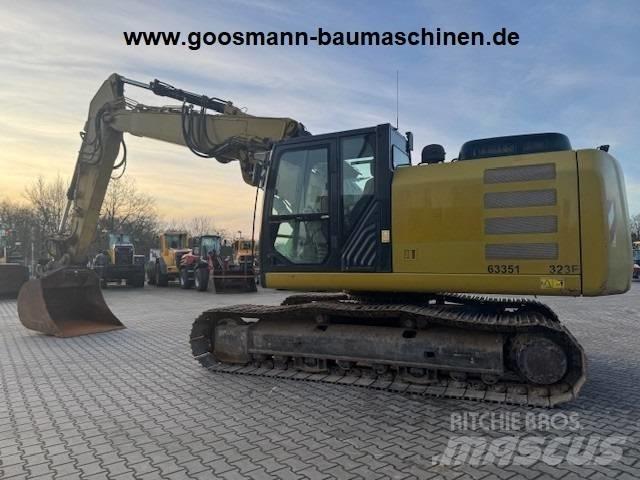 CAT 323 EL Pásové rýpadlá