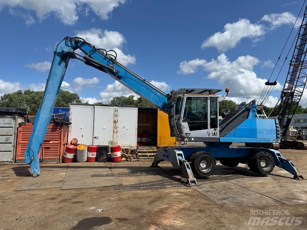 Fuchs MHL 335 Stroje pre manipuláciu s odpadom