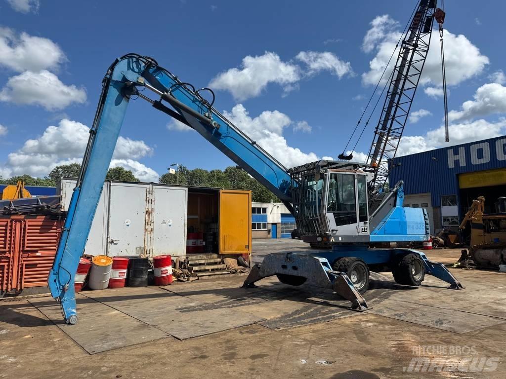 Fuchs MHL 335 Stroje pre manipuláciu s odpadom