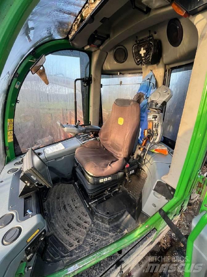 John Deere 1110 E Lesné traktory