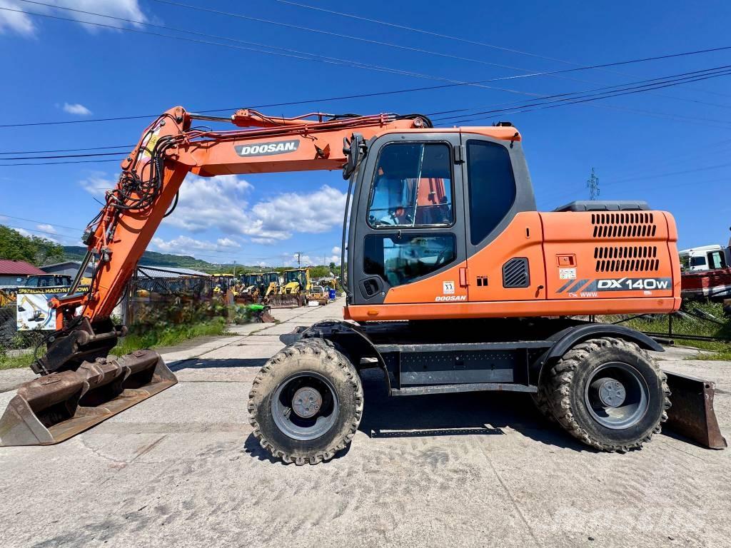Doosan DX 140 W-3 Kolesové rýpadlá