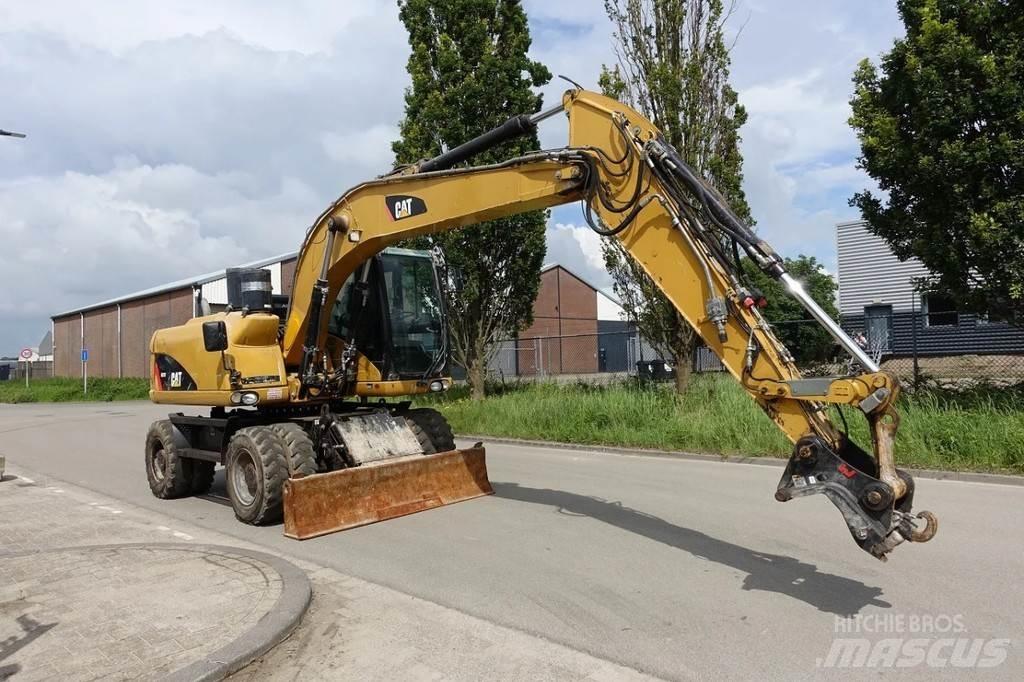 CAT M313 D Kolesové rýpadlá