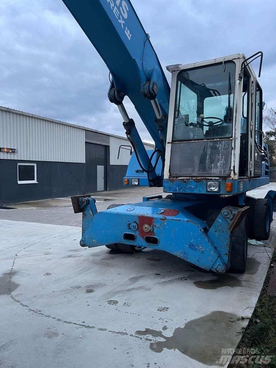 Fuchs MHL 331 Kolesové rýpadlá