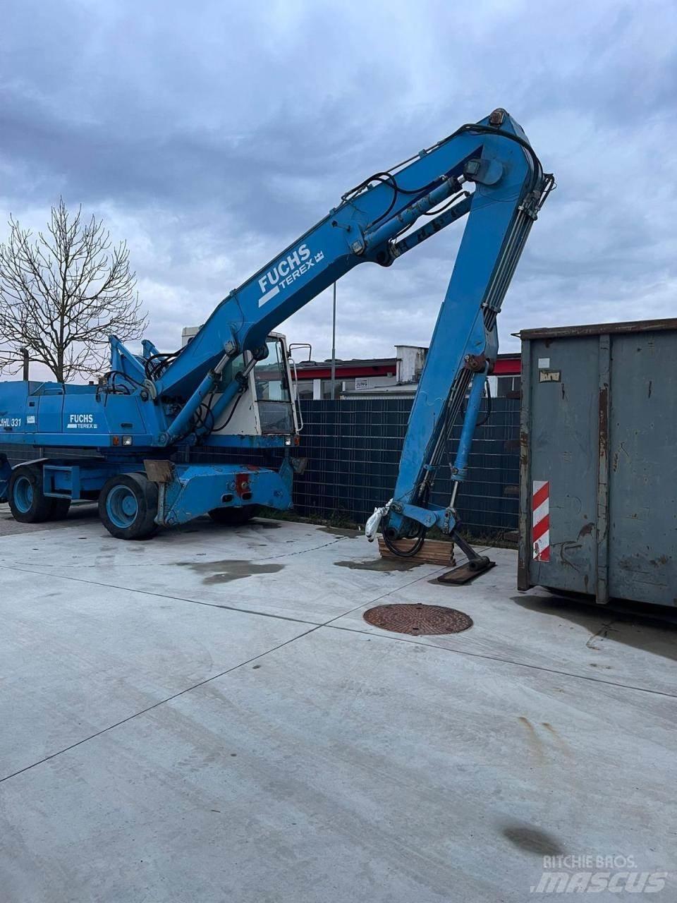 Fuchs MHL 331 Kolesové rýpadlá