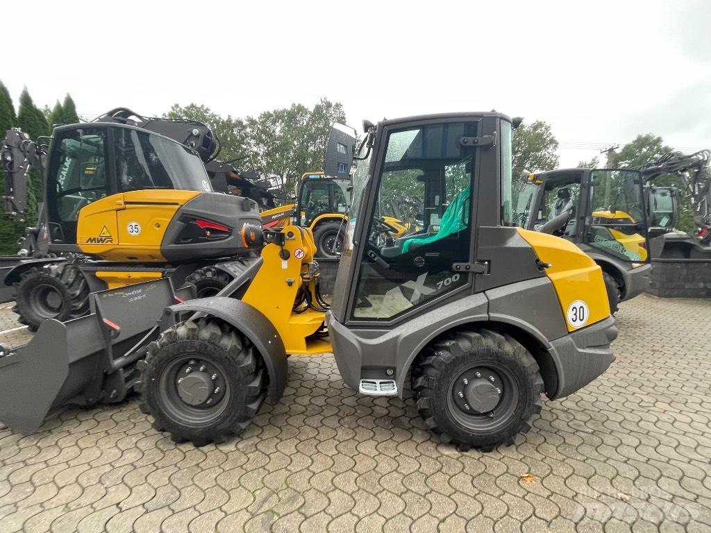Mecalac AX700 Kolesové nakladače