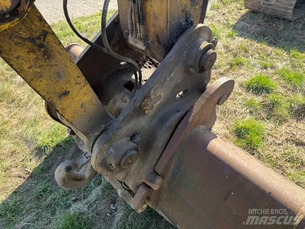 New Holland E215 Pásové rýpadlá