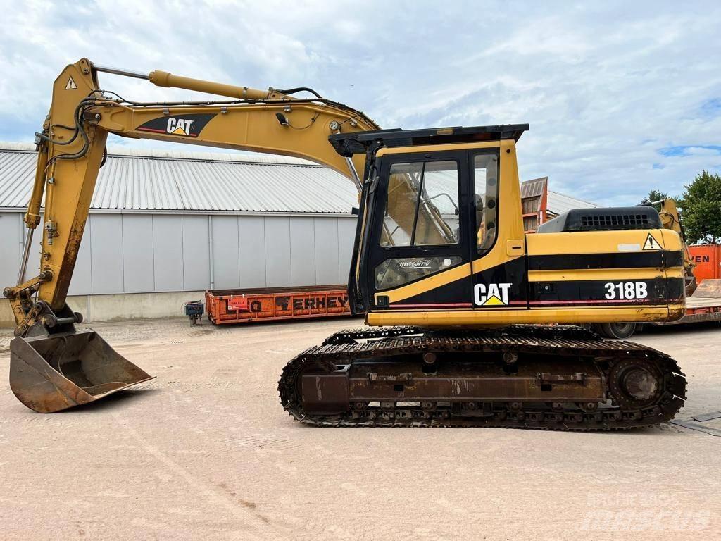 CAT 318BL Pásové rýpadlá