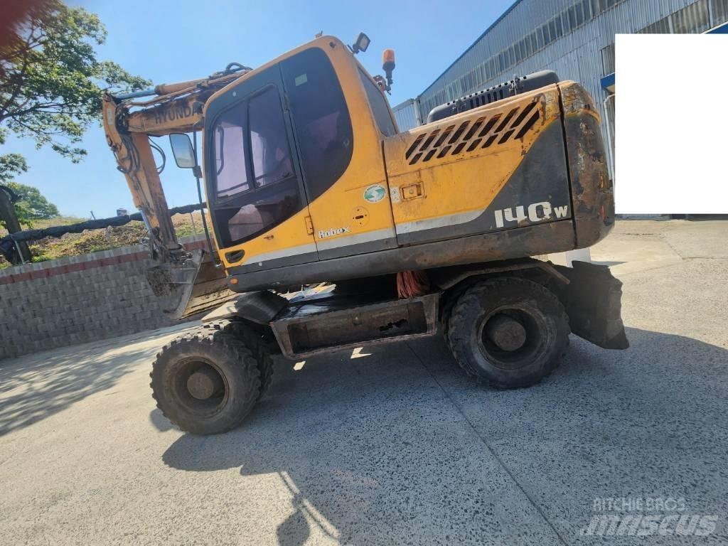 Hyundai Robex 140 W Kolesové rýpadlá
