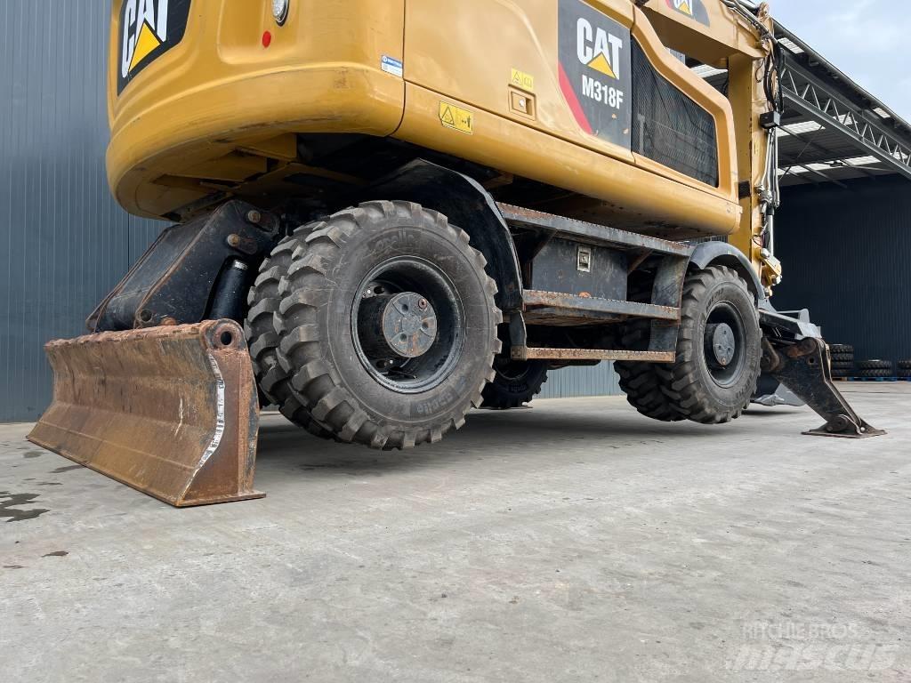 CAT M318F Kolesové rýpadlá