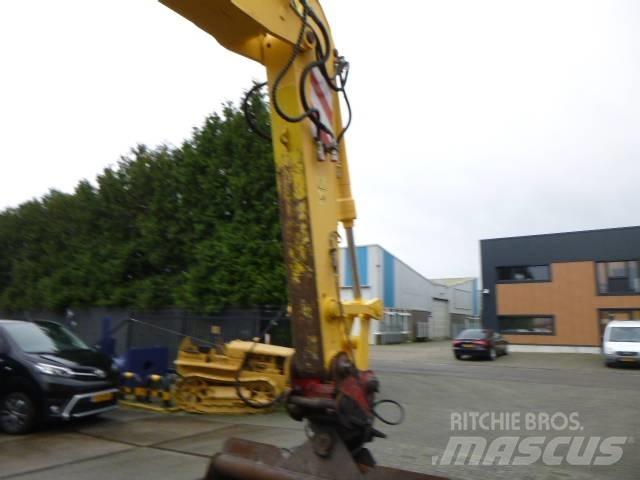 New Holland MH Plus Kolesové rýpadlá