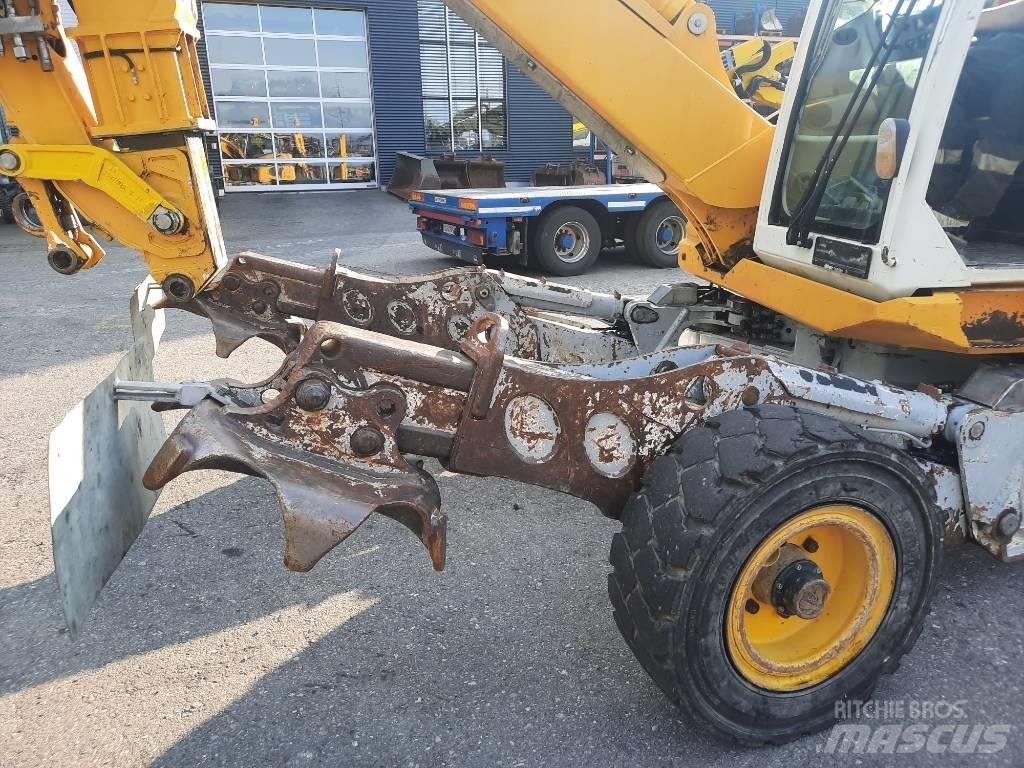 Menzi Muck M525 Kolesové rýpadlá