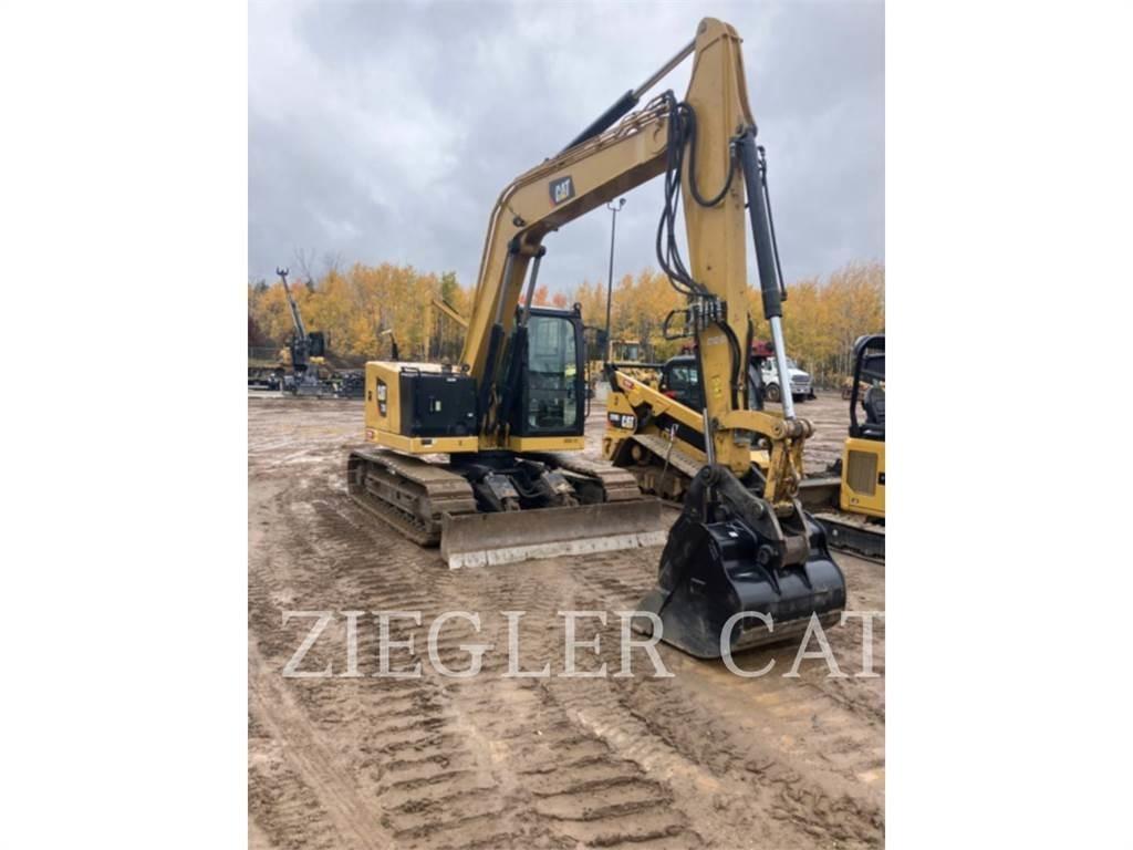 CAT 310 Pásové rýpadlá
