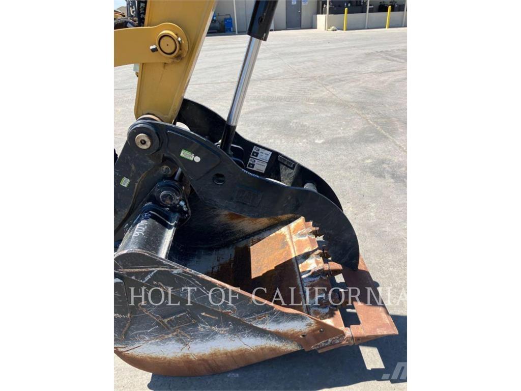 CAT 310 Pásové rýpadlá