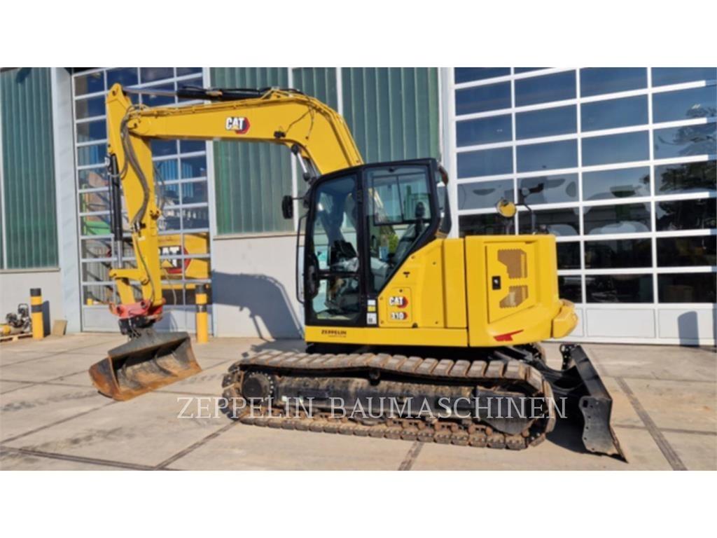 CAT 310 Pásové rýpadlá
