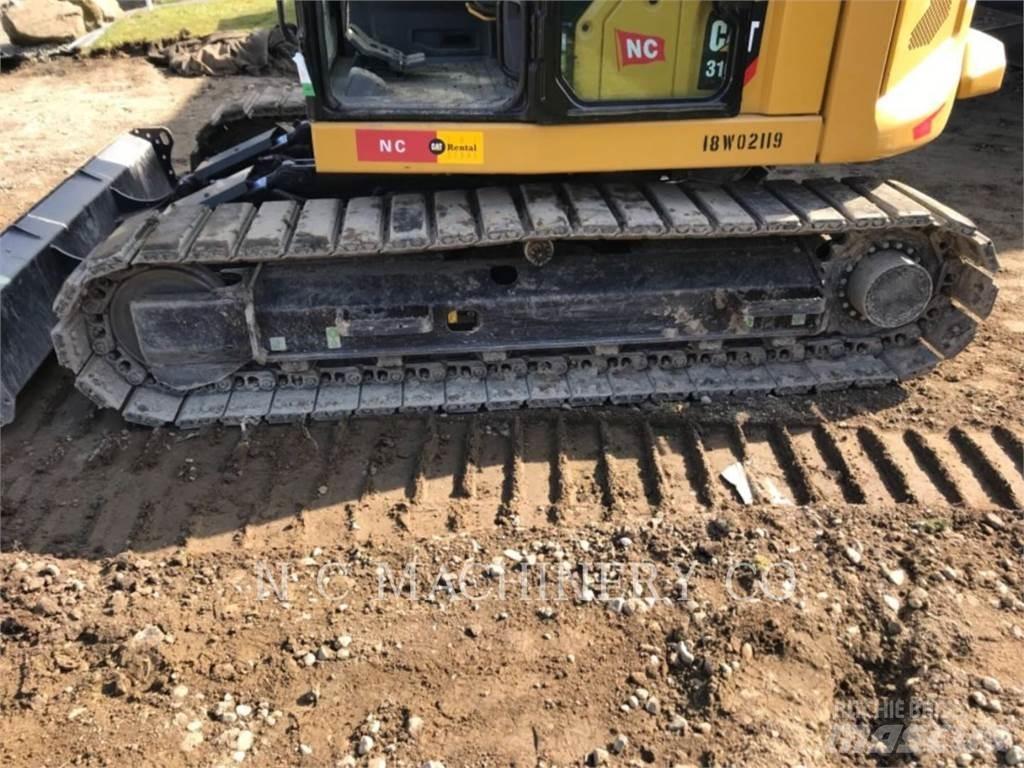 CAT 310 Pásové rýpadlá