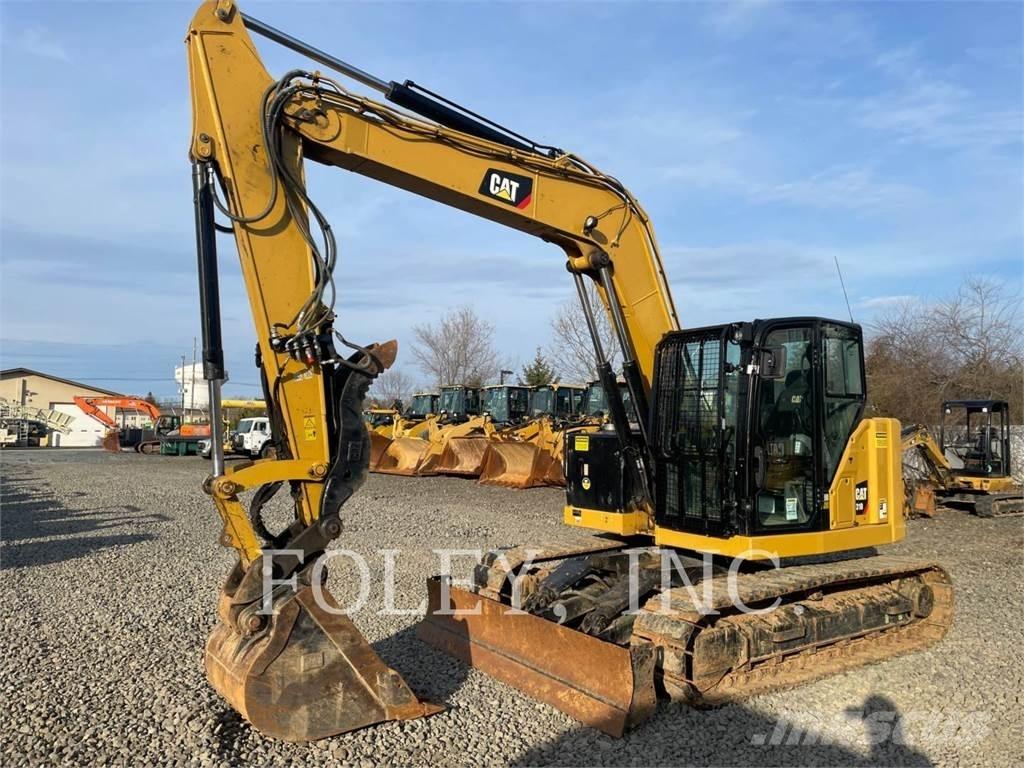 CAT 310-07 Pásové rýpadlá