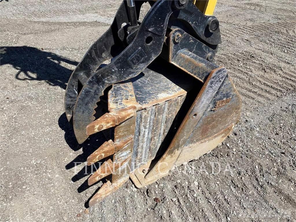 CAT 310-07 Pásové rýpadlá