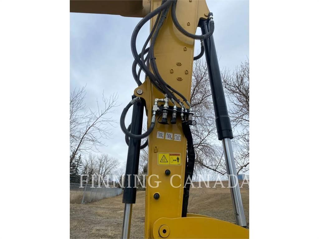 CAT 310-07 Pásové rýpadlá