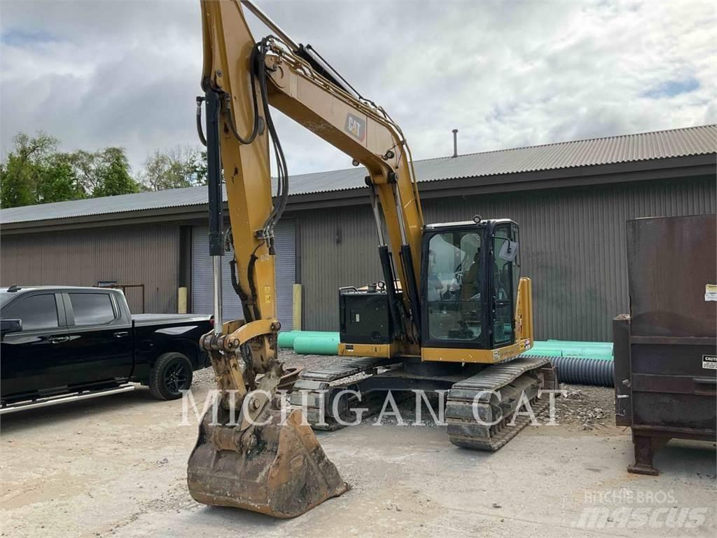 CAT 310 AQ Pásové rýpadlá