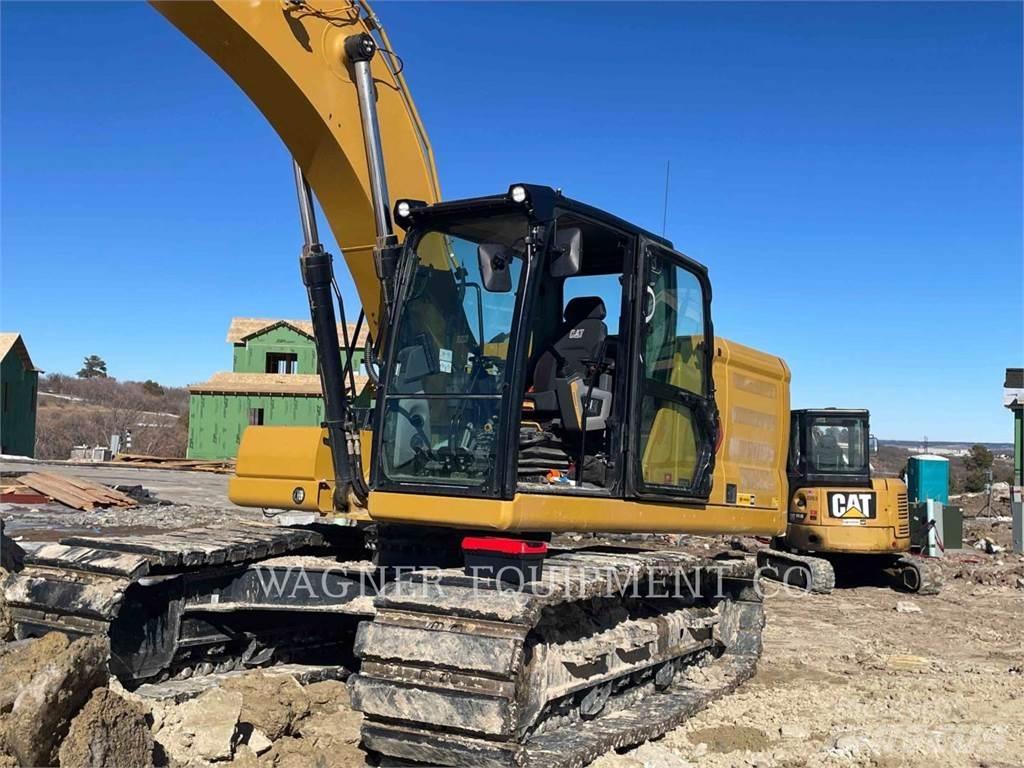 CAT 323 Pásové rýpadlá