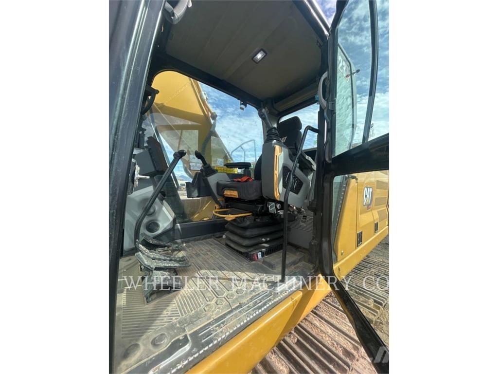 CAT 323 CF Pásové rýpadlá