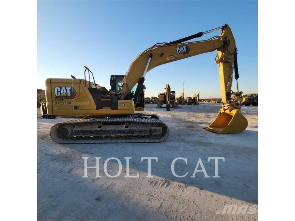 CAT 323 TC Pásové rýpadlá