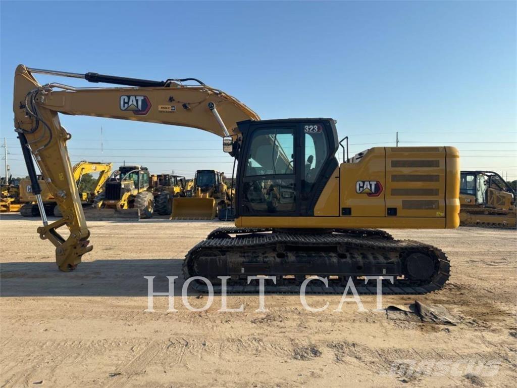 CAT 323 TC Kolesové nakladače