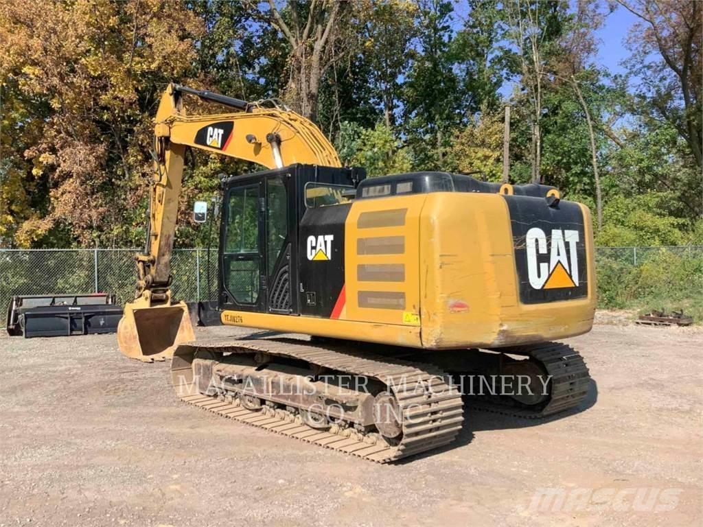 CAT 323FL Pásové rýpadlá