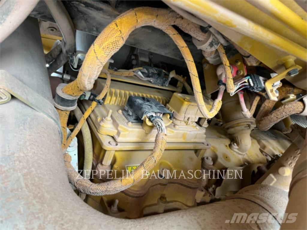 CAT 775G Kĺbové nákladné autá
